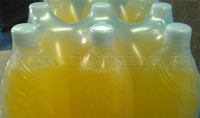 Упаковка бутылок ПЭТ в термоусадочную пленку